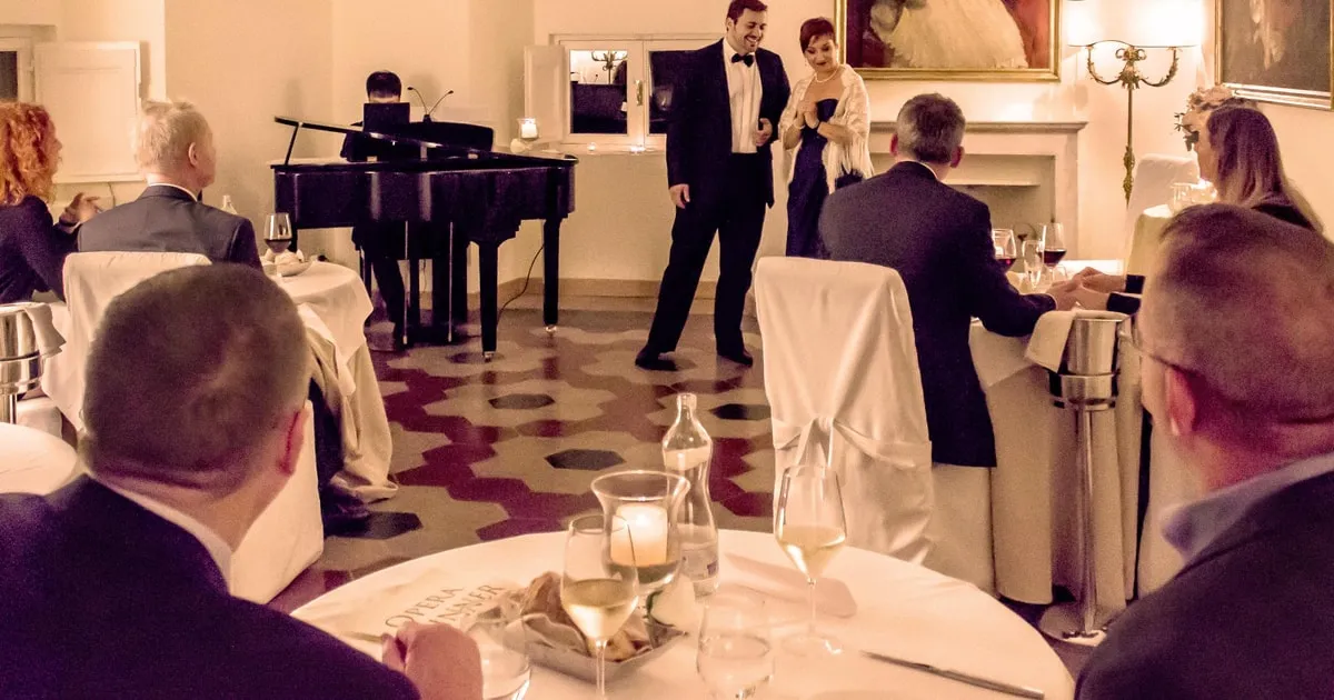 A candlelit dinner in the Innocenzo X Hall of Palazzo Pamphilj with arias sung between the courses, an opera dinner in Rome, opera houses in Rome